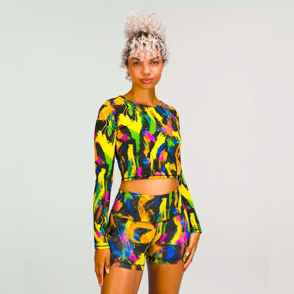 Lululemon Wunder Train Cropped Long Sleeve Shirt size 12. Undertone black multi